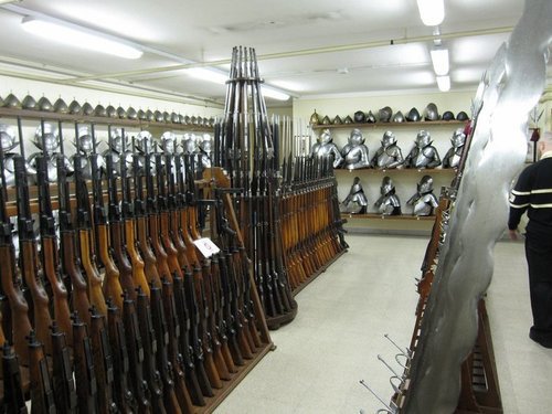 sig-mkpo-subguns-on-bottom-left-and-mp43-44s-top-left-ready-to-go-in-the-swiss-guards-armory-note-the-two-handed-swords-to-the-right1